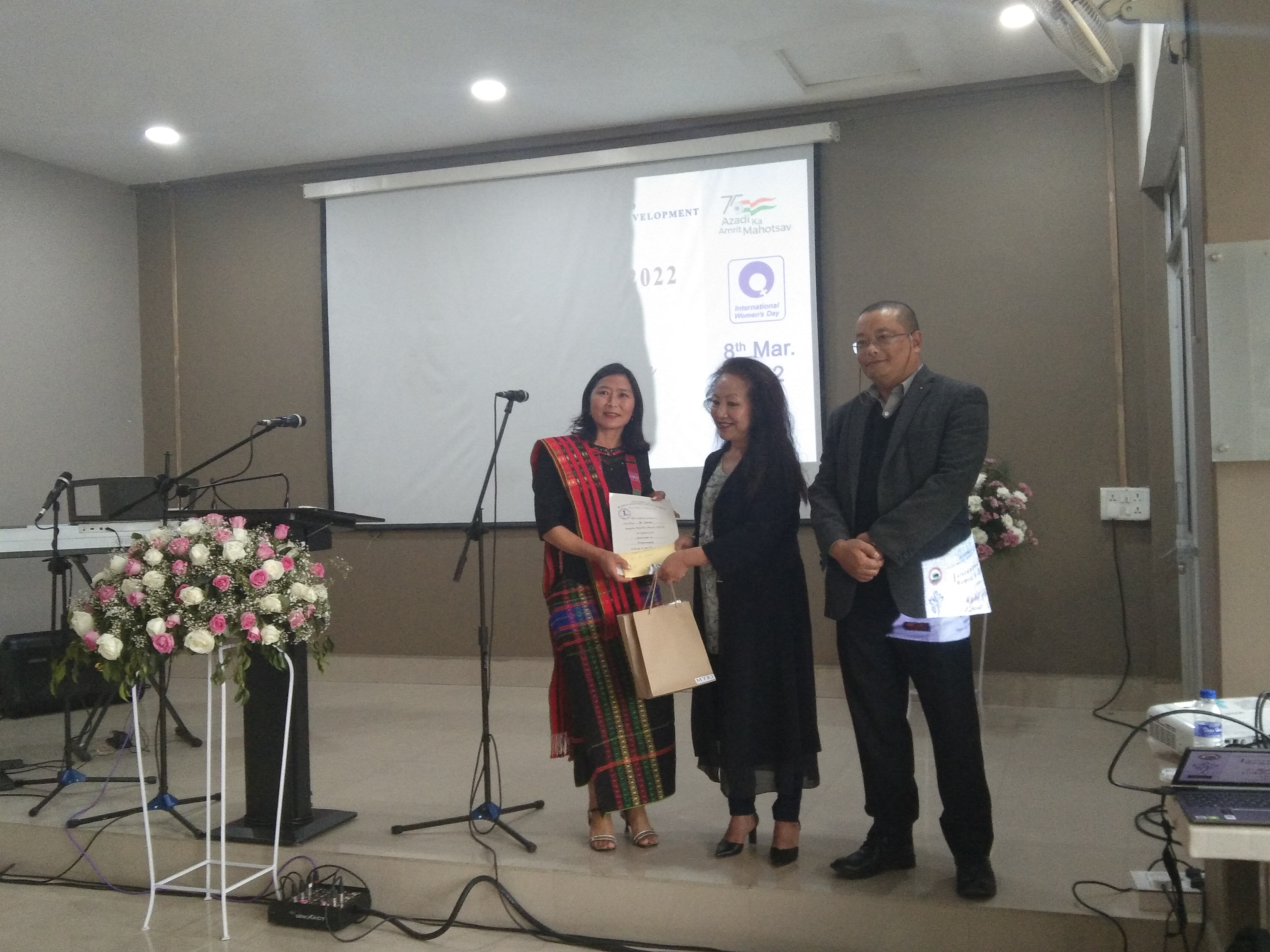 MykiFest Award 2021-2022 is being presented to an awardee during the ceremony held at Sakhrie Park, Kohima