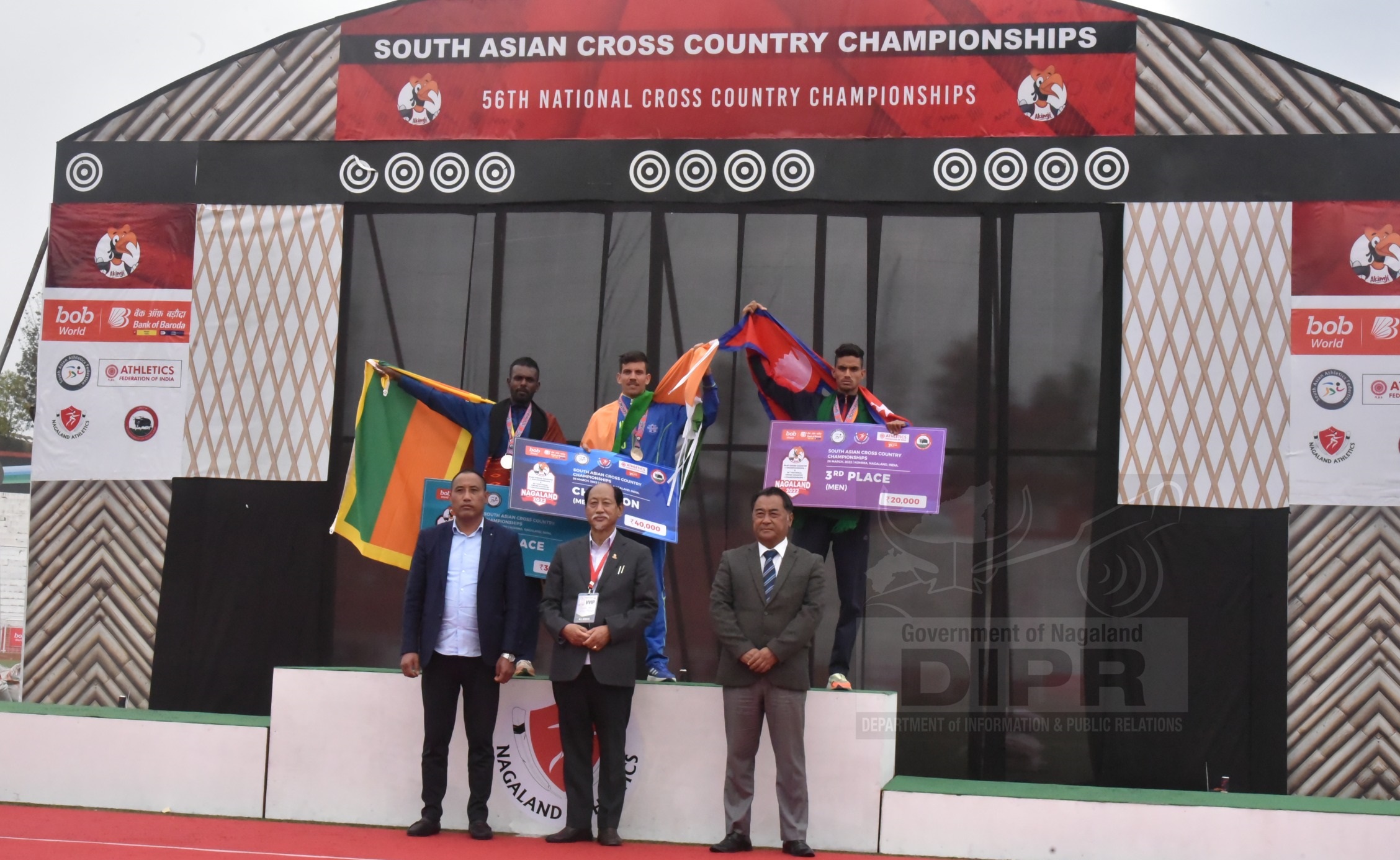 Chief Minster, Neiphiu Rio and dignitaries with the winners of Men (10km) SAAF and National event at IG stadium, Kohima