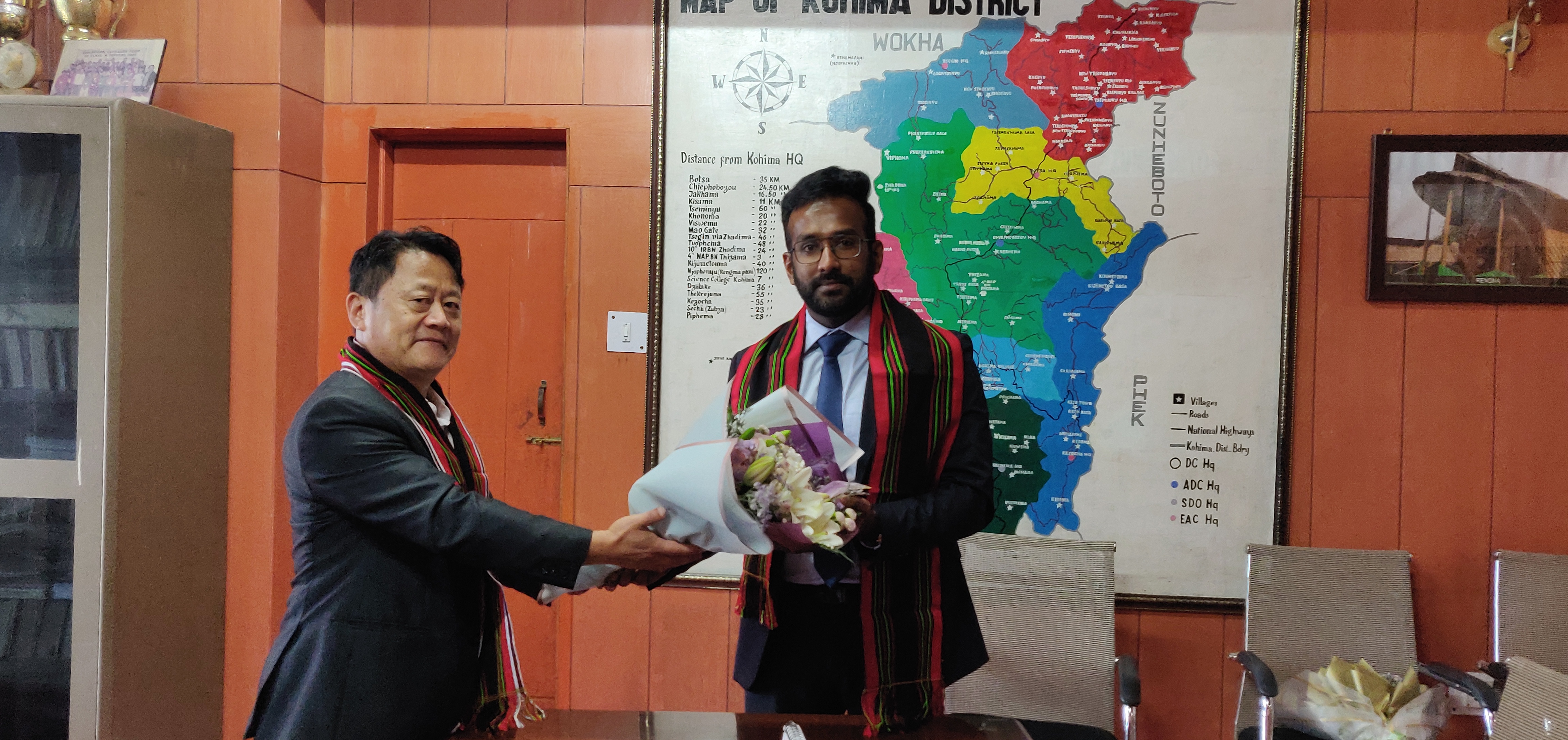 Incoming Deputy Commissioner Kohima, Shanavas C taking over charge as DC Kohima from the outgoing DC, Gregory Thejawelie at the office chamber of DC Kohima on 14th June 2022. (DPRO Kohima)