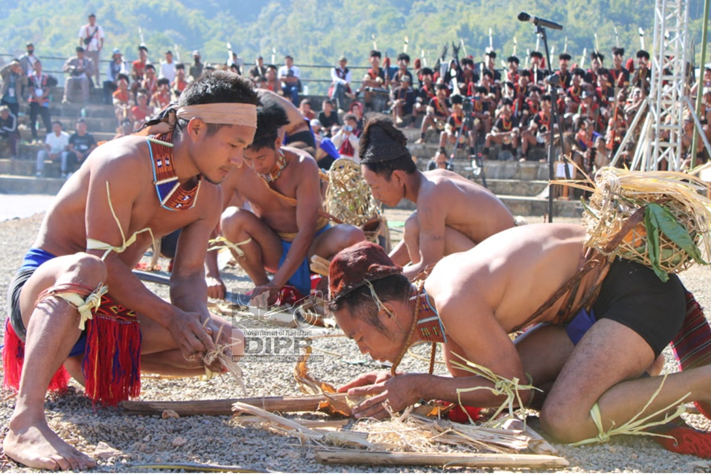 Participants from 11 wards participating in the Fire making competition during International Hornbill Festival Mon Edition 2025 at Konyak Heritage Complex, Mon on 10th December 2025.