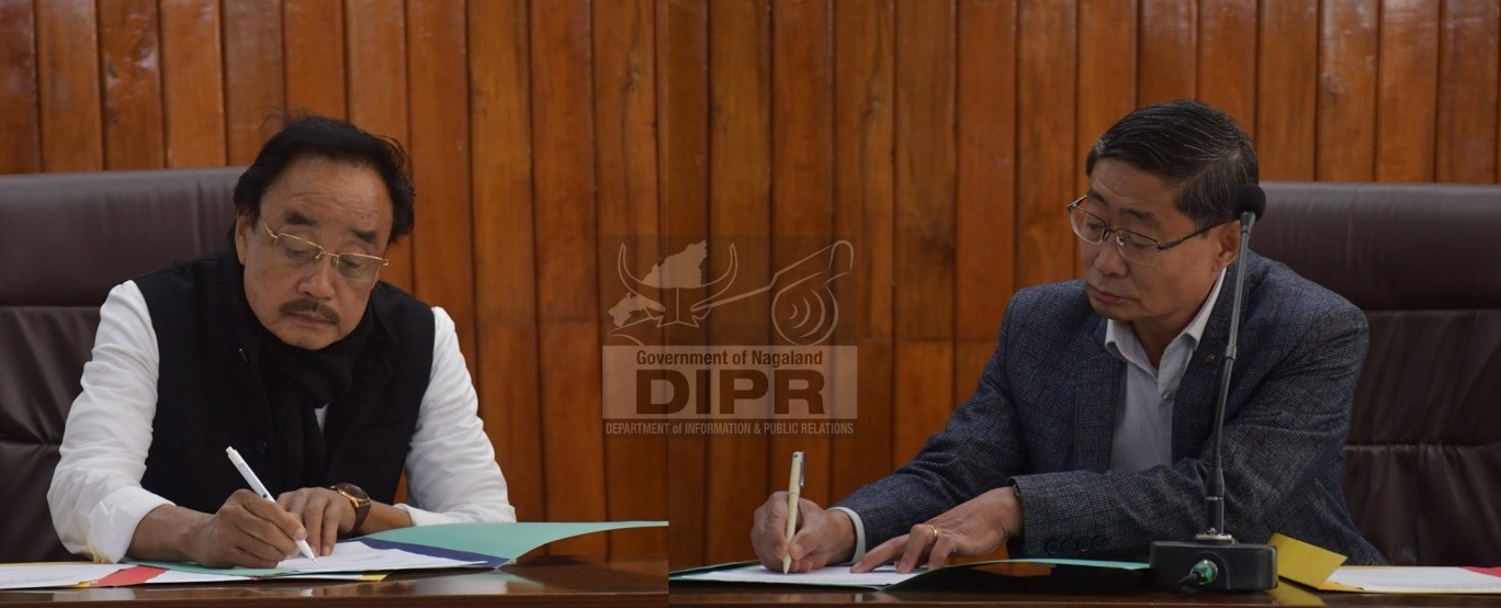 CS Sentiyanger Imchen, IAS and G.H Ramlia, newly sworn in Upa-Lokayukta of Nagaland, signing the official record register during the oath-taking ceremony at the Nagaland Civil Secretariat, Kohima, on 16th January 2026.