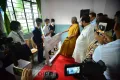 Union Finance Minister interacting with students during her visit to Dr. Neilhouzhu Kire GHSS