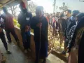 84 years old senior citizen standing in the queue to cast her vote at Tening