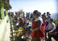 A mother waiting to cast her vote