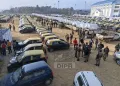 Vehicles and security personnel moving out from IG Stadium to the collecting and receiving centre at DC office Kohima