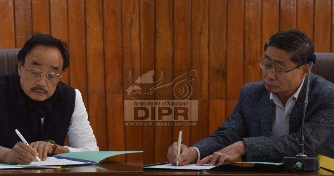 CS Sentiyanger Imchen, IAS and G.H Ramlia, newly sworn in Upa-Lokayukta of Nagaland, signing the official record register during the oath-taking ceremony at the Nagaland Civil Secretariat, Kohima, on 16th January 2026.